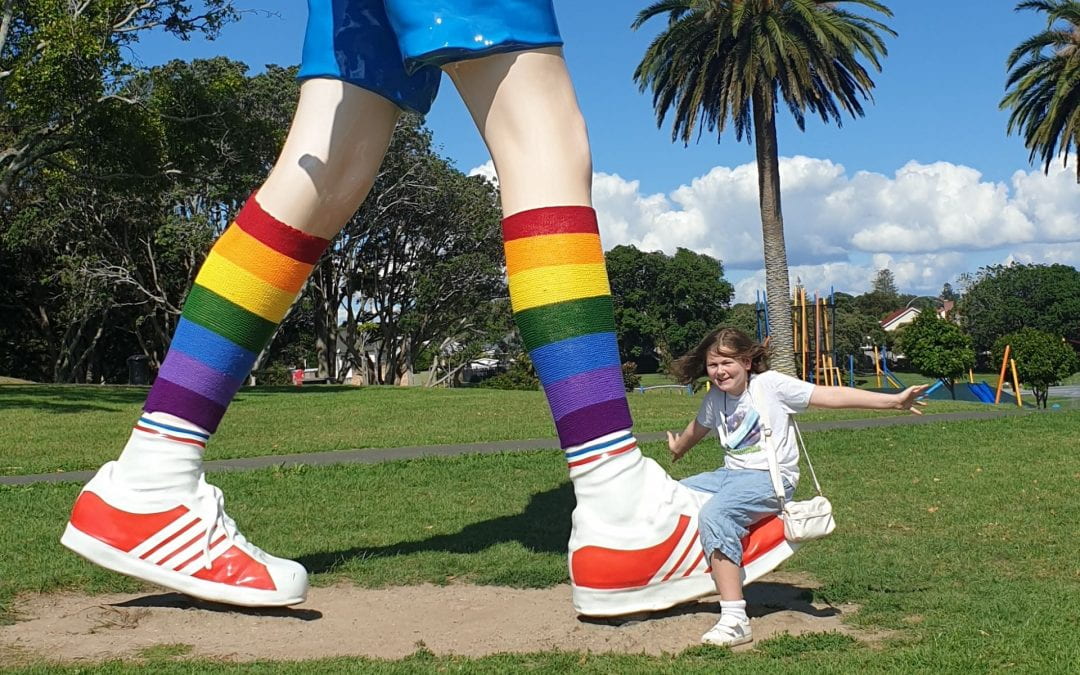 University of Auckland alumna knits rainbow leg warmers for Boy Walking sculpture